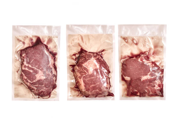 Close-up on chunks of red meat at the butcher's shop