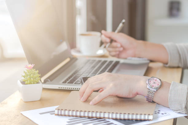 Woman Working in Coffee Shop