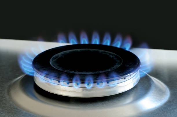 istock Natural gas burning on kitchen gas stove 910543724
