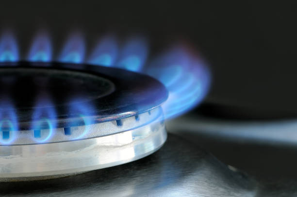 istock Natural gas burning on kitchen gas stove 910543774