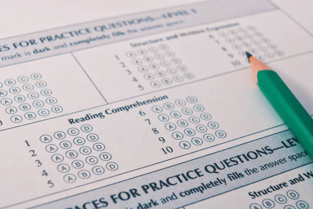 Close-up photograph of a perfect grade on a scantron test Close-up photograph of a perfect grade on a scantron test. computer key stock pictures, royalty-free photos & images
