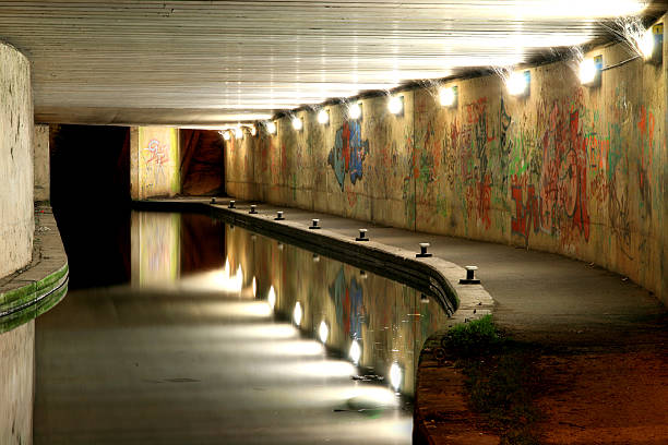 istock Night shot of canal underpass 91055020