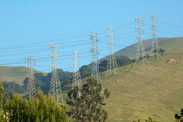 istock Power lines running across country 91055564