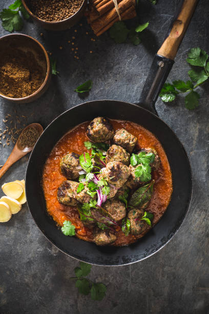 istock Meatballs with Indian and Curry Sauce 910556446