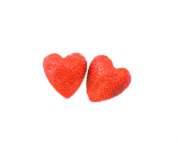 istock Strawberry and red Heart isolated on white background. 910563594
