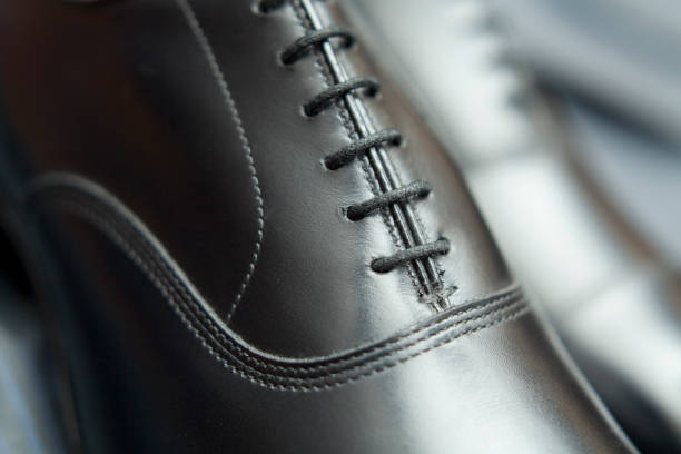 istock black leather mens shoe detail 910567954