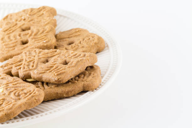 istock Cookies. Ginger biscuits. home baked cookies with sugar and sprinkles on white background 910575666