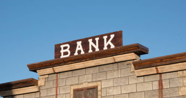vecchio segno di banca - west bank foto e immagini stock