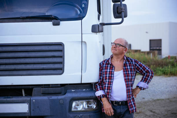 istock Posing next to his truck 910589332