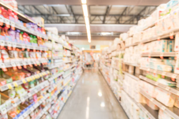istock Blurred crackers, pasta, sauces, grains, rice, oils vinegars in grocery  store 910590208