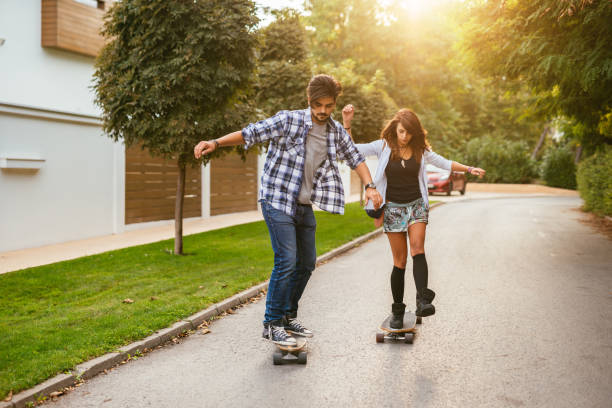 istock Showing their long board skills 910592632