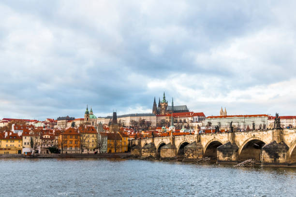 istock A winter afternoon at the Charles bridge in Prague 910593660