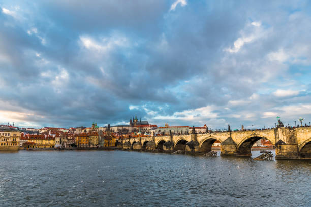 istock Stormy sky over the Charles bridge in Prague 910597102