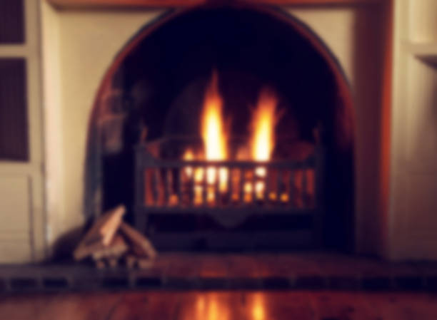 istock Blurred image of fireplace as a background 910600266
