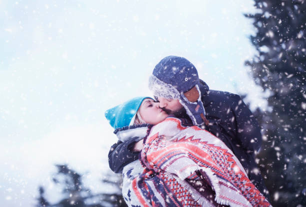 istock Happy couple outdoors in winter 910615158