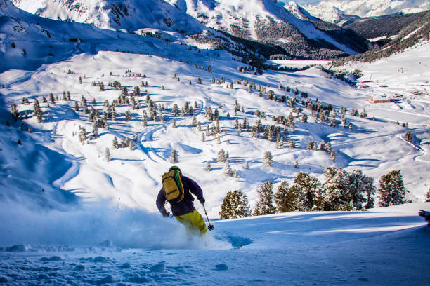 istock Freeride skier charging down through fresh powder snow 910615272