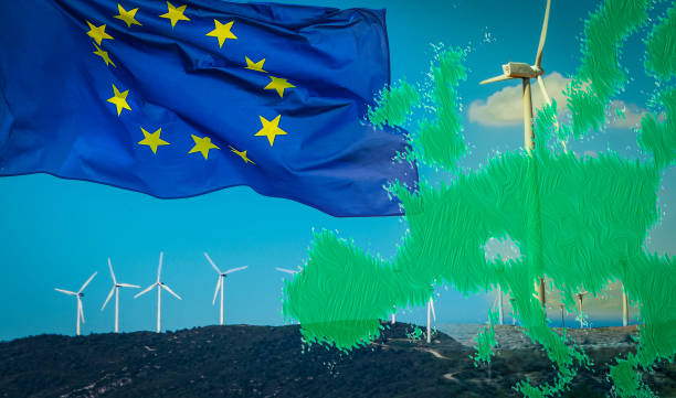 Wind turbines with EU flag and EU green map. Energy programme of EU stock photo