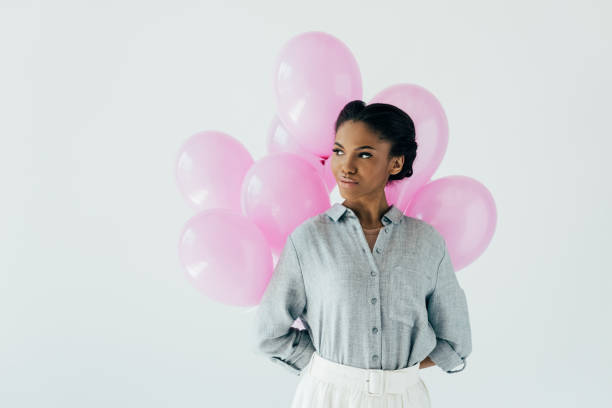 istock african american woman with balloons 910616122