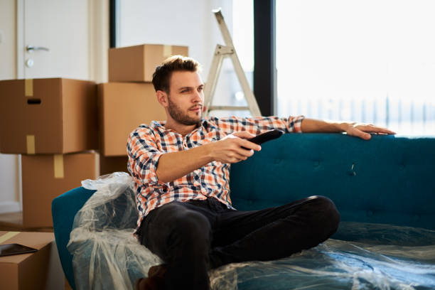istock Man in new apartment 910630488