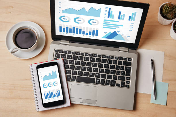graphs and charts elements on laptop and smartphone screen - marketing internet chart ideas imagens e fotografias de stock