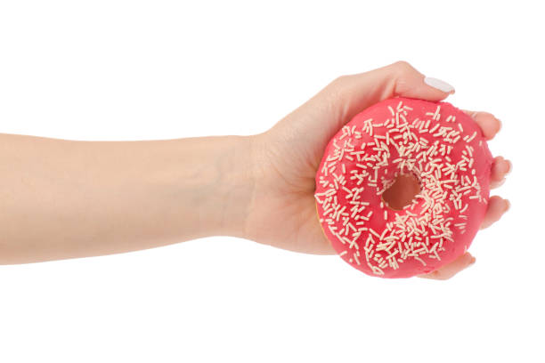 istock Donuts sweetness frosting in hand 910633514