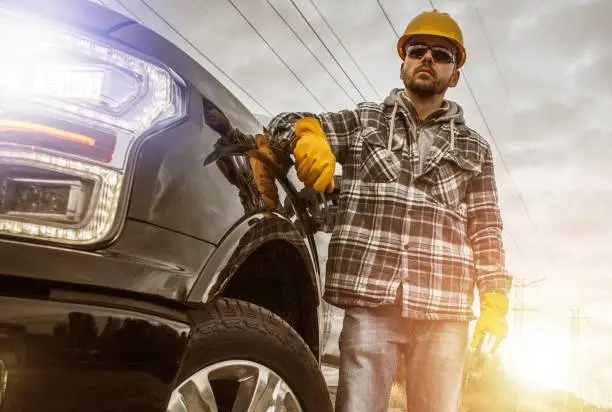 Photo of Contractor and His Pickup Truck