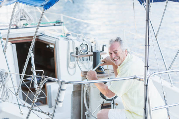 istock Captain steering a luxury boat 910640642