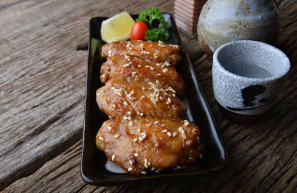 istock Fried chicken wing with spicy sauce in Japanese style. 910643290