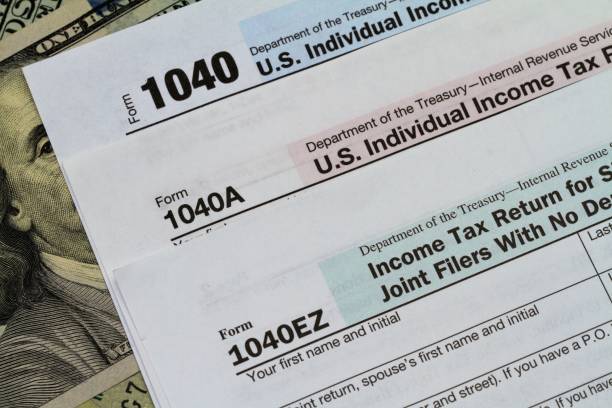 istock IRS tax return forms- 1040, 1040A and 1040EZ 910652040