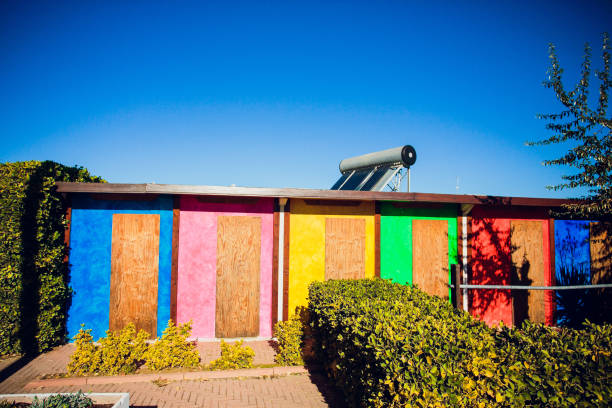 istock beach changing rooms blue cabin sea dressing room lockers 910654796