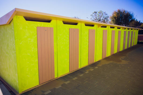 istock beach changing rooms blue cabin sea dressing room lockers 910655746