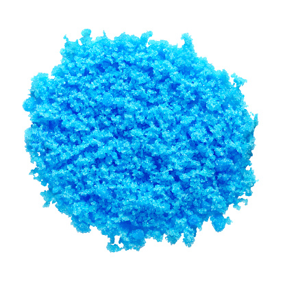 Cupric sulfate isolated on white. Bright, blue copper sulfate, CuSO4, also called blue vitriol or bluestone. Salt, used as algicide in swimming pools, for fireworks and in schools to grow crystals.