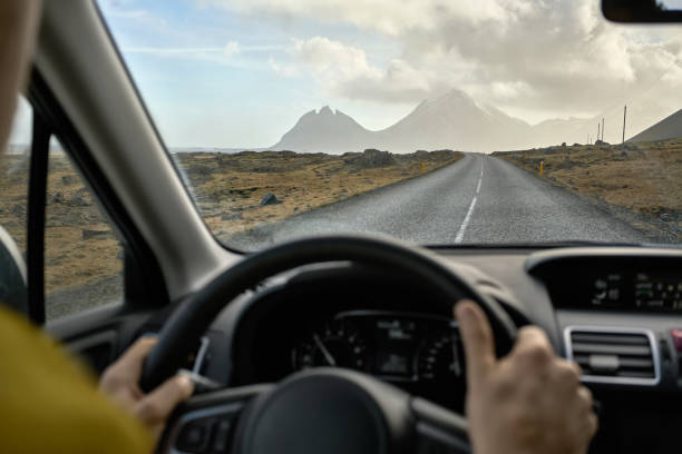 istock View at Icelandic landscape from inside car 910658716