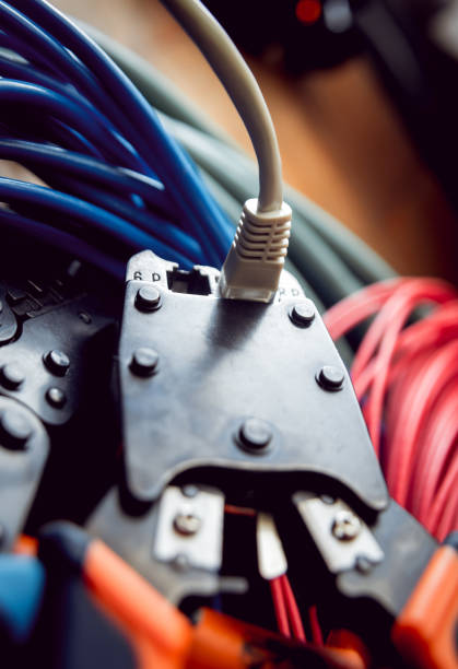 istock Electrical equipment. Electricity cable and crimper. 910672958