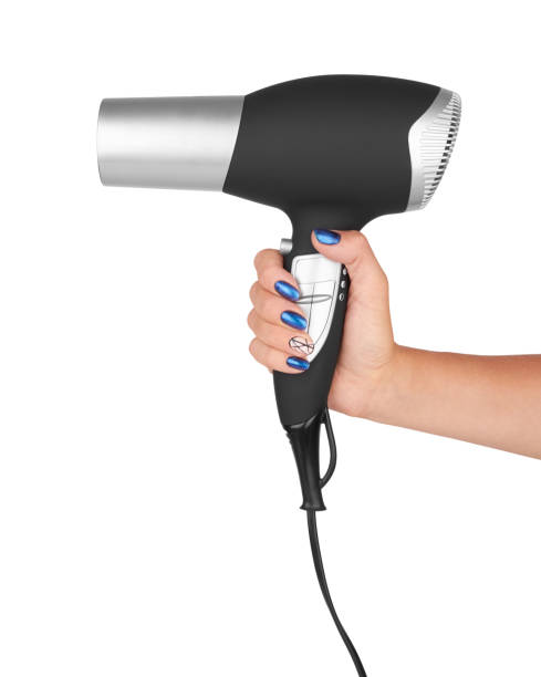 istock Hair dryer in hand 910673206