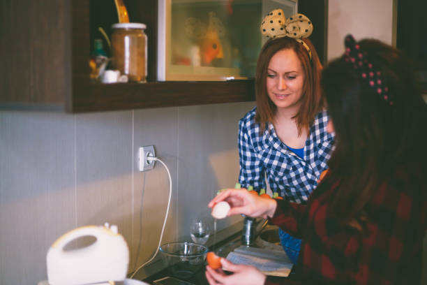 istock Young woman in the kitchen 910684554