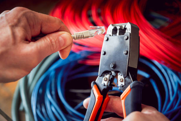 istock Electrical equipment. Electricity cable and crimper. 910691380