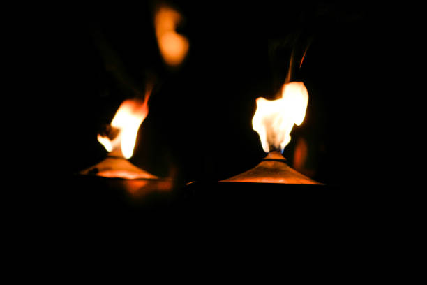 istock Close up of torch on black background 910694798