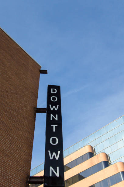 istock Welcome Sign To The Downtown District In Vertical Orientation 910698128