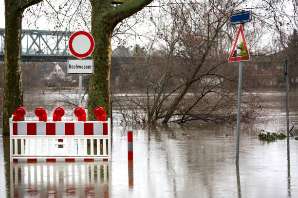 istock Closed road during floodwaters at River Main 910698328