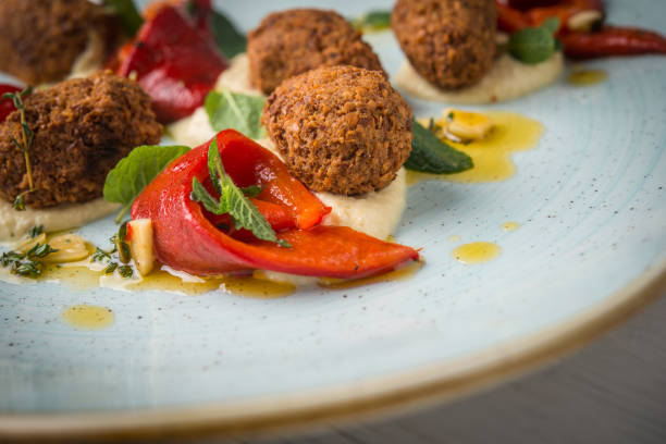 istock Vegan falafel medallion, hummus and roasted pepper 910699254