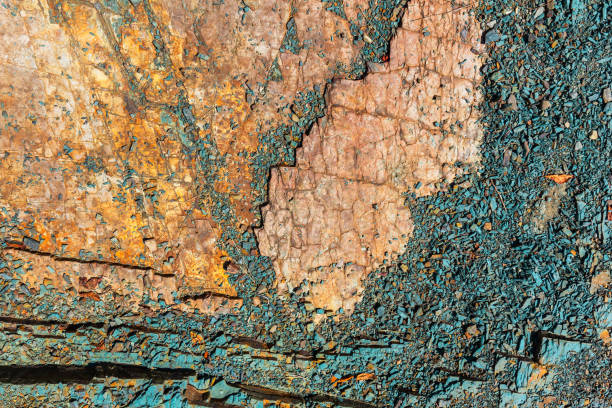 istock orange and blue stones by the river. background 910701520