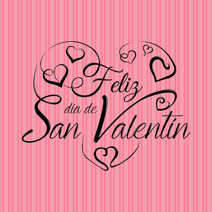 Lettering: Feliz Dia de San Valentin -Happy Valentines Day in Spanish language- in black ink on a pink background - Vector image