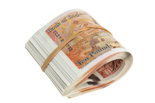 istock Bundle of UK ten pounds banknotes 910704980