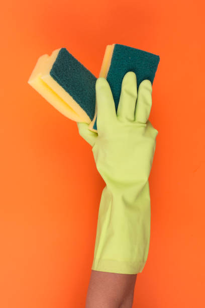 istock Cleaning with Dishwashing gloves and Dish sponge 910706996