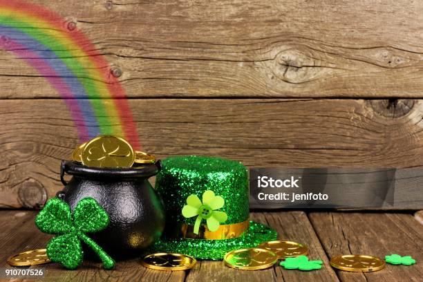 St Patricks Day Pot Of Gold With Rainbow Decor Against Wood Stock Photo - Download Image Now