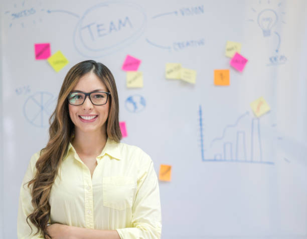 istock Portrait of a woman working at a creative office 910714754