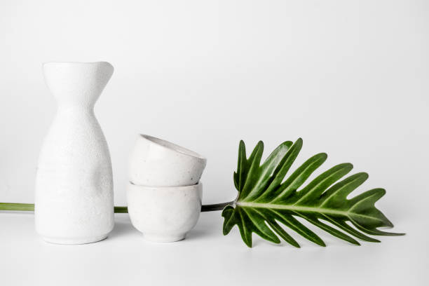 istock Close up of Japanese Sake drinking set on a white background. 910715348