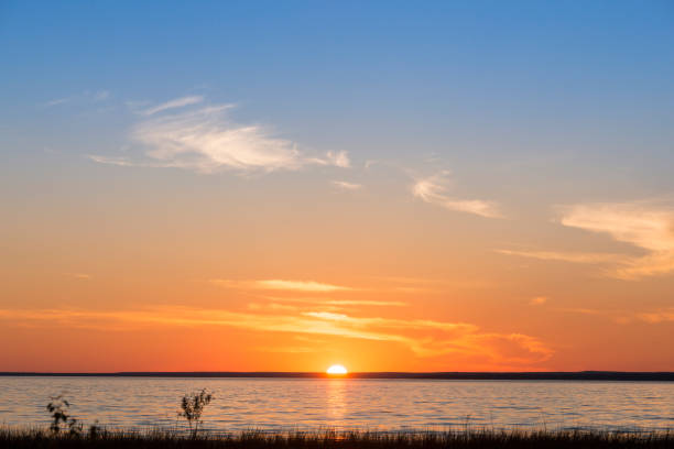 Sun setting on the Horizon of Lake Huron in Michigan Upper Peninsula