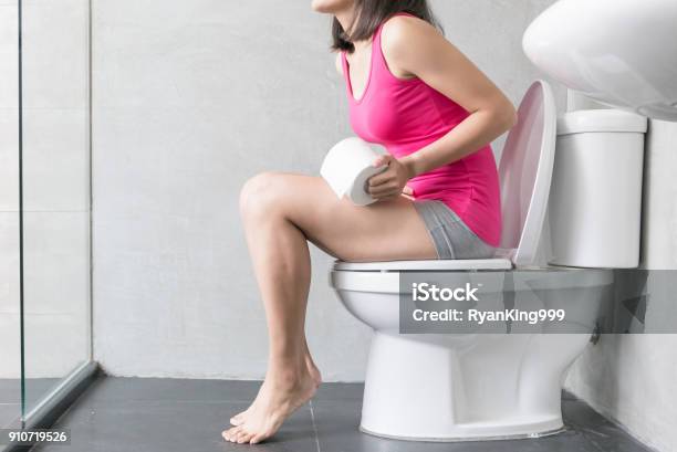 Woman Feel Pain With Constipation Stock Photo - Download Image Now - Constipation, Asia, Frustration